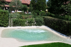 piscina naturale bio couture  con idromassaggio e nuoto contro corrente